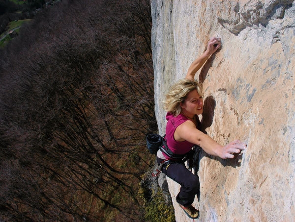 Angelika Rainer climbing Outsider 8a+ at Cornalba