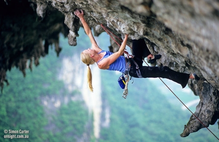 Yangshuo, China - Monique Forestier onsighting Over the Moon (5.12c), Moon Hill, near Yangshuo, China.