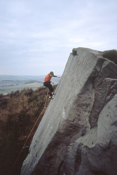 The Roaches, England - Guy Maddox testing his Wings of Unreason E4 6a, The Roaches, Peak District, UK.