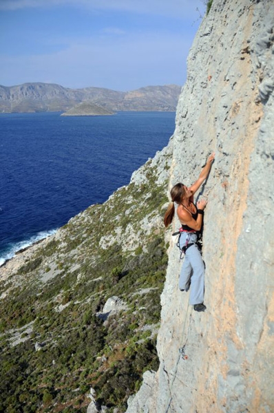 Telendos - Pescatore - When Monica T. Sancho is not busy massaging other climbers into post-climbing bliss, she enjoys a good climb herself. Here, on Karabolas 6a, Pescatore, Telendos, Kalymnos
