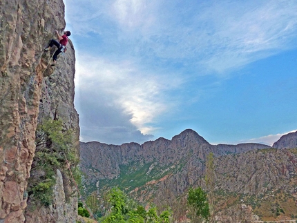 Kemaliye International Outdoor Sport Festival - Competition winner Alper Tolga Kocatas climbing above the village.