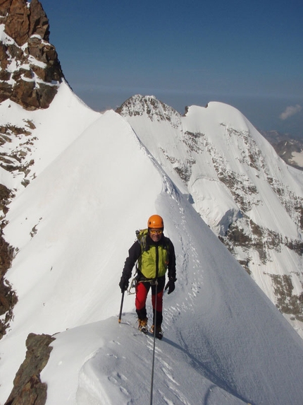 Scerscen - Bernina traverse - Alberto Magliano negotiating the knife-edge ridge along the Scerscen - Bernina traverse