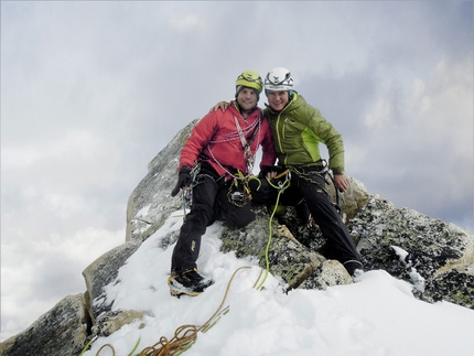 Arwa Spire - 28/09/2012: Roger Schäli & Simon Gietl on the summit of Arwa Spire after having made the first free ascent of Fior di Vite (800m, 90°, M5, 7a)