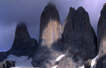 Torres del Paine, Patagonia, Chile - Torres del Paine, Patagonia, Chile, seen from the Mirador. From left to right: Torre Sur, Torre Central, Torre Norte. The North Tower was first ascended on 27/12/1957 by an Italian expedition led by Guido Monzino. Torre Central del Paine (2460m) was first climbed by British mountaineers Chris Bonington and Don Whillans via the North Ridge (VI, A2 600m) on 16/01/1963. The next day the Italians Armando Aste, Vasco Taldo, Nando Nusdeo, Josve Aiazzi and Carlo Casati made the second ascent of the mountain, climbing via the same line. On 9 February 1963 the Italians made the first ascent of the South Tower.