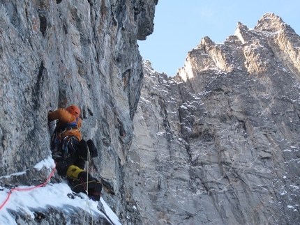 Difficult winter ascent of Trollveggen Troll Wall in Norway