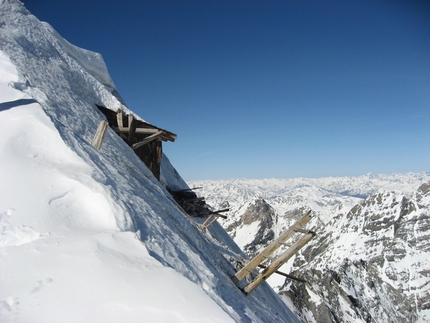 Gran Zebrù - Wooden huts just below the summit.