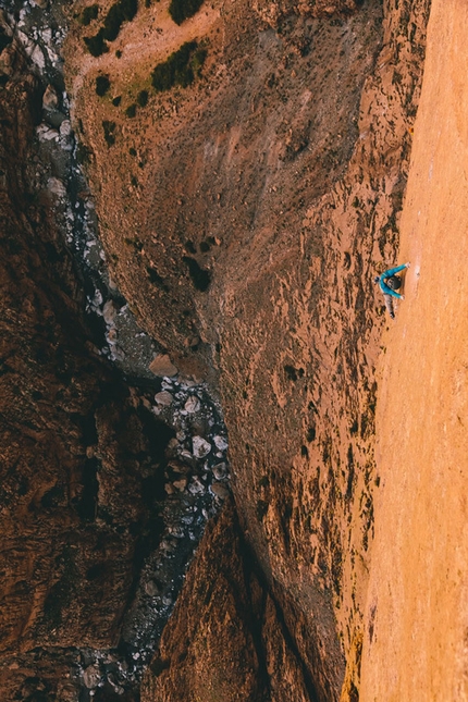 Ines Papert, Lisi Steurer, Patrik Aufdenblatten, Tadrarate, Taghia, Morocco - April 2013: Lisi Steurer on the slabby second pitch