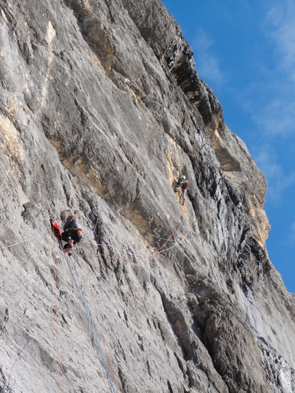 Colonne D'Ercole, Civetta - Alessandro Baù, Alessandro Beber and Nicola Tondini during the first ascent of their route Colonne d'Ercole (1200m, max IX, obl. VIII+), Punta Tissi, Civetta, Dolomites.