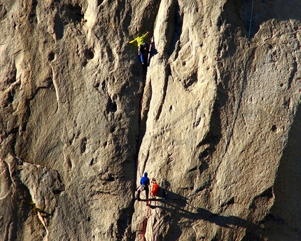 Tommy Caldwell, Kevin Jorgeson, El Capitan - Tommy Caldwell climbing pitch 2 (5.13a) on day 1, belayed by Kevin Jorgeson during their Dawn Wall push, El Capitan, Yosemite