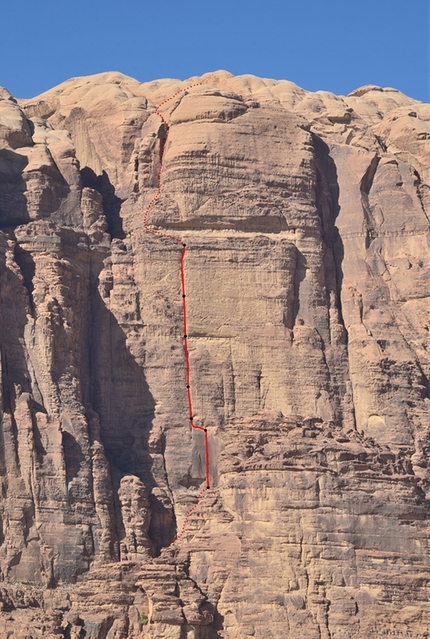 Wadi Rum, Jordan - The route line of the climb Fatal Attraction (8a+, 6a+, 6c+, 6c+, 7a, 7b, 450m) at Jebel Rum, Wadi Rum, Jordan, established in 2014 by the Slovak climbers Jozo Kristoffy and Martin Krasnansky.