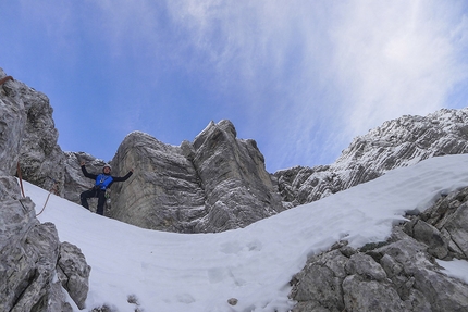 Triglav, Slovenia - Triglav North Face: Matevž Vukotic reaching the Amphitheatre at the second day during the winter ascent of the routes Prusik - Szalay and Obraz Sfinge, carried out from 23 - 26 December 2014 together with Matevž Mrak.