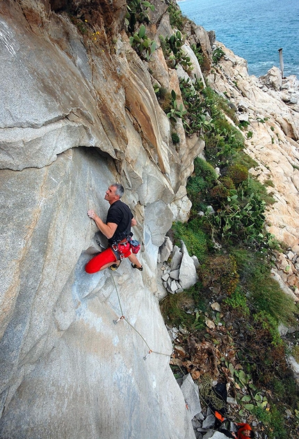 Cala Usai, Villasimius, Sardinia - Paolo Contini climbing Rock Girls 7a at Villasimius, Sardinia