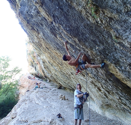 Matteo Menardi - Matteo Menardi climbing at Rodellar, belayed by Sandro Neri.