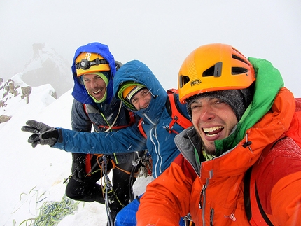 Kyzyl Asker, Kyrgyzstan, Kokshaal Too - Kyzyl Asker 2015: Anže Jerše, Miha Hauptman and Uroš Stanonik on the top of Mr Mojo Risin, West Face of Pik Carnovsky