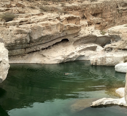 Oman sport climbing Arnaud Petit, Read Macadam, Alex Ruscior - Swimming at Wadi Bani Khalid, Oman