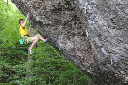Stefano Carnati climbs Action Directe in the Frankenjura
