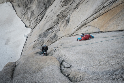 Bugaboos, Howser Towers, Canada, Leo Houlding, Will Stanhope - Will Stanhope belays Leo Houlding across the hardest pitch of the Bugaboos Howser Towers link-up. A delicate 5.12+ (E6) slab traverse linking the starkly contrasting brutal cracks of the steep, 500m Central tower. 