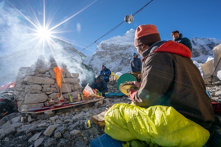 Everest - Lhotse traverse, Sherpa Tenji, Jon Griffith - Everest - Lhotse traverse: an early morning Puja at Everest Base Camp