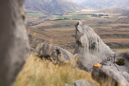 Charlotte Durif, Josh Larson, A World Less Traveled - Charlotte Durif bouldering at Flock Hill, New Zealand.
