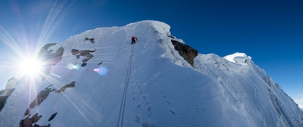 Karakorum, Pakistan, Nelson Neirinck, Jess Roskelley, Kurt Ross - Kondus valley: Jess Roskelley races the last few minutes of daylight to the summit of Chhota Bai