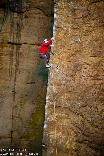 Millstone - Pete Whittaker climbing up the other side of the inspirational Master's Edge at Millstone, England