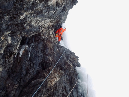 Pordoi Dolomites, Simon Gietl, Vittorio Messini - Simon Gietl climbing the first pitch of Pandora on Pordoi, Dolomites