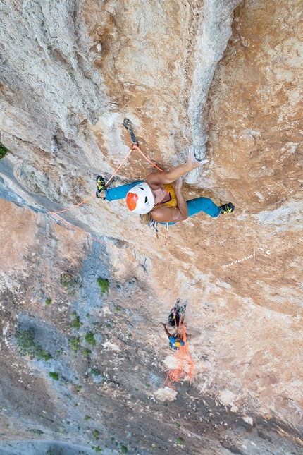 Aleksandra Taistra - Aleksandra Taistra climbint the crux pitch of Amico Fragile in Sardinia