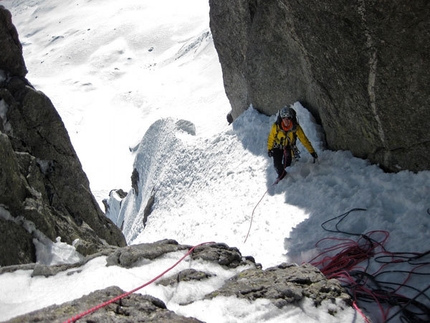 Ice climbing Val Masino - Anna Ceruti at the top of Goulotte Santanna