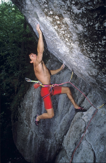 Wolfgang Güllich, Action Directe, Frankenjura - Wolfgang Güllich climbing his Action Directe at Waldkopf in Frankenjura, Germany. Widely recognised as the world's first 9a and the absolute benchmark of its grade, Güllich established the line on 14 September 1991 aged 30.