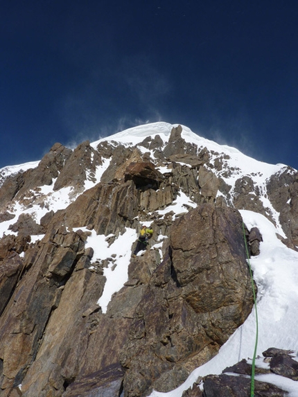 Kyrgyzstan - Kristoffer Szilas on the upper part of Peak Alexandra