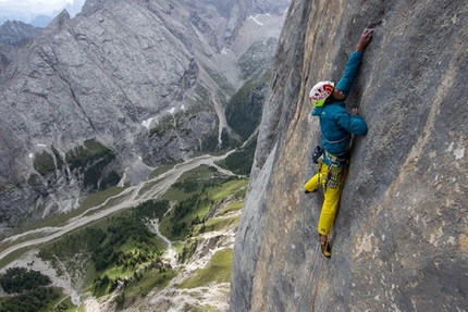 Hansjörg Auer - Hansjörg Auer making the first ascent of his route Bruderliebe (800m/8b/8b+), Marmolada, Dolomites.