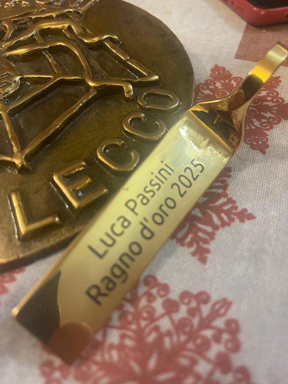 Luca Passini riceives the 'Ragno d'Oro'