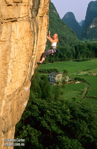 Yangshuo, China - Monique Forestier attempting Nine Deep, One Shallow (5.13d), Banyan Tree Crag, near Yangshuo, China.