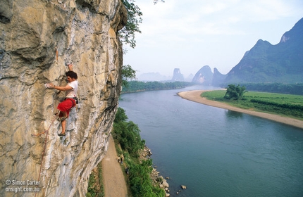 Yangshuo, China - David Gliddon on his Flaming Hornets (5.12c), at Riverside on the Li River, Yangshuo, China.