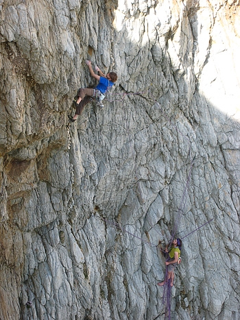 Gogarth, Wales - Gogarth: Nicolas Favresse pulling through the steepness on the final pitch of The Mad Brown E7