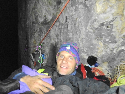 Spiz di Lagunaz - Marco Anghileri on 14 March 2012 at the bivy after the prow during his winter solo of Via dei Bellunesi up the SW Pillar of Spiz di Lagunàz (Pale di San Lucano, Dolomites).