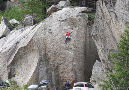 Gabriele Moroni climbing 29dots highball boulder problem in Valle dell'Orco, Italy