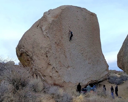 Miles Adamson climbing Too Tall to Fall, huge highball at Bishop