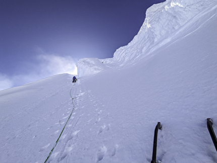 Mt. Charles Alaska, Fred Caloggero, Joseph Hobby - Joseph Hobby climbs a rimed pitch to the summit ridge of 'Spectre' on Mount Charles, Alaska