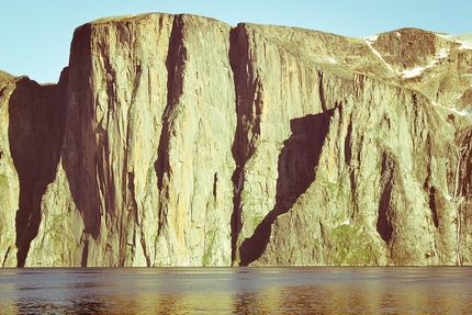 The Arctic Project - Greenland - El Cap by the sea? The 850m Impossible wall bathed in midnight sun.