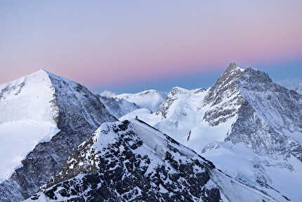 Eiger, Mönch, Jungfrau, Philipp Brugger, Nicolas Hojac - Nicolas Hojac and Philipp Brugger on the summit of the Eiger, with the Moench and Jungfrau north faces in the background on 05/04/2025