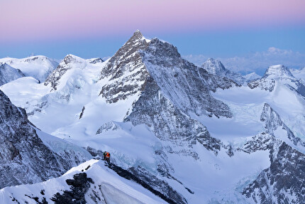 Eiger, Mönch, Jungfrau, Philipp Brugger, Nicolas Hojac - Nicolas Hojac and Philipp Brugger on the summit of the Eiger, with the Moench and Jungfrau north faces in the background on 05/04/2025
