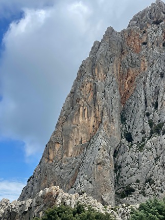 Rebolting in Sardinia - Punta Cusidore in Sardinia which hosts the climb 'L’ombra della mia mano', rebolted in spring 2025 by the Italian mountain guides