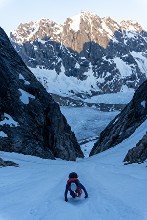 Greenland, Ben Kent, Robbie Milne - Robbie steaming up the approach couloir, midnight in Greenland
