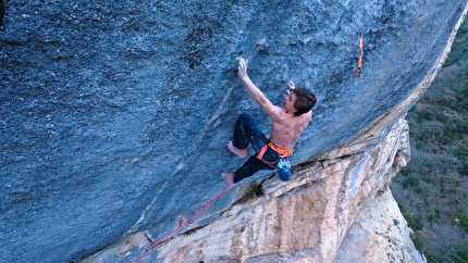 Erwan Legrand Buoux Bombé Bleu - Erwan Legrand making the first ascent of 'Bombé Bleu' at Buoux in France. The route was bolted in 1991 by Marc Le Menestrel and is arguably one of the biggest prizes in sport climbing