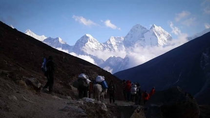 Nepal's mountains and reality in two videos