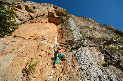 Jerzu, Sardinia - Not all routes are difficult. Here Cecilia Marchi climbs Mosca Bianca at the Castello.