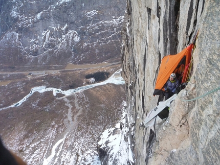 Trollveggen Troll Wall, Norway - 01/2013: Andy Kirkpatrick, Tormod Granheim and Aleksander Gamme during their winter ascent of Suser Gjennom Harryland on Trollveggen (Troll Wall) in Norway.