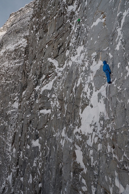 Sagwand, Austria - Hansjörg Auer belayed by Peter Ornter leads through friable rock up Schiefer Riss, Sagwand.