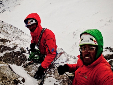 Sagwand, Austria - Hansjörg Auer and David Lama at their highpoint during their first attempt of Schiefer Riss on the Sagwand.
